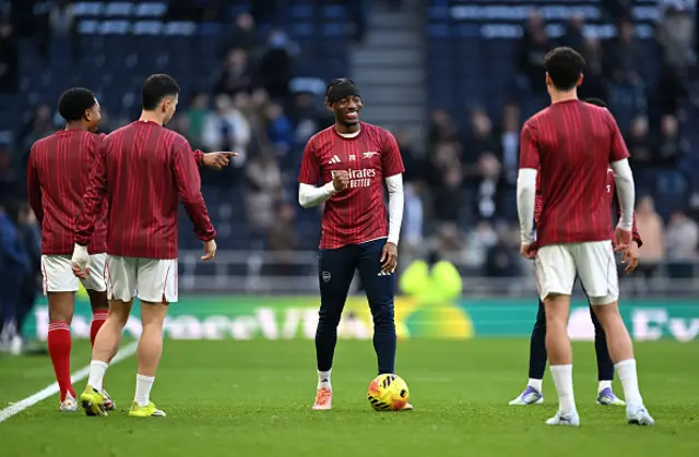 Noni Madueke of Arsenal reacts as he warms up