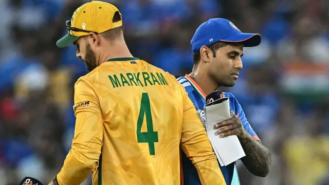 ndia's captain Suryakumar Yadav (R) shakes hands with his South African counterpart Aiden Markram during the toss