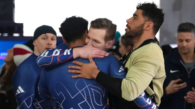 GB bobsleigh team embracing