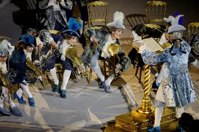 An orchestra performs during the Milano Cortina 2026 Winter Olympics Closing Ceremony