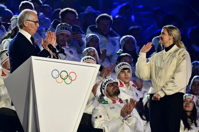President of the Organising Committee for the 2026 Olympic and Paralympic Winter Games Giovanni Malago delivers a speech next to President of the International Olympic Committee (IOC) Kirsty Coventry