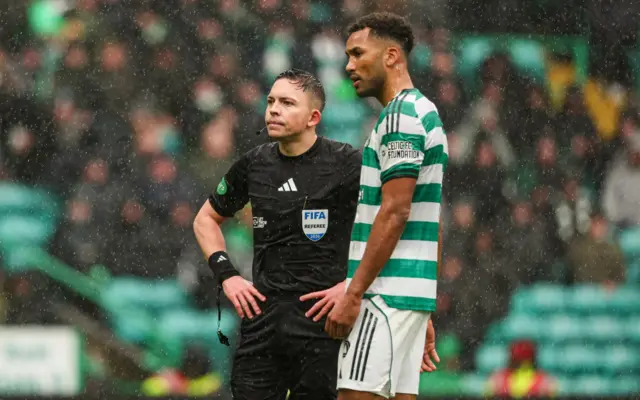 Auston Trusty and referee Matthew MacDermid