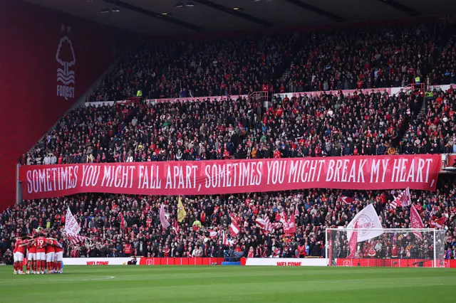 Fans of Nottingham Forest display a banner