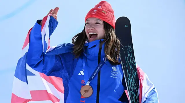 Zoe Atkin celebrating with her medal