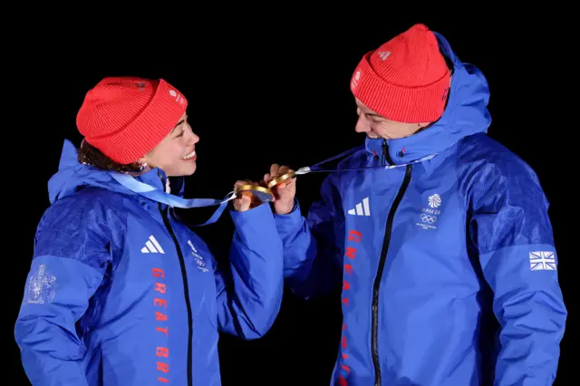 Matt Weston and Tabby Stoecker with their Winter Olympic golds