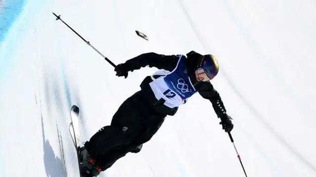 Mischa Thomas in action with her phone loose behind her