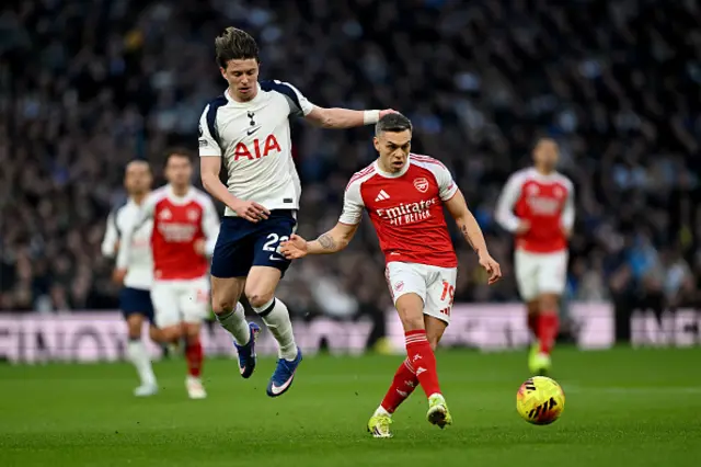 Leandro Trossard of Arsenal passes the ball under pressure from Conor Gallagher