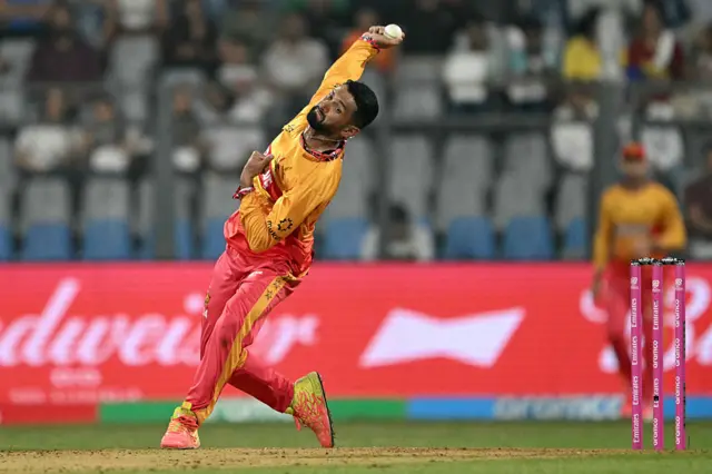 Zimbabwe's captain Sikandar Raza delivers a ball