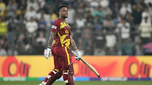 Shimron Hetmyer walks back to the pavilion