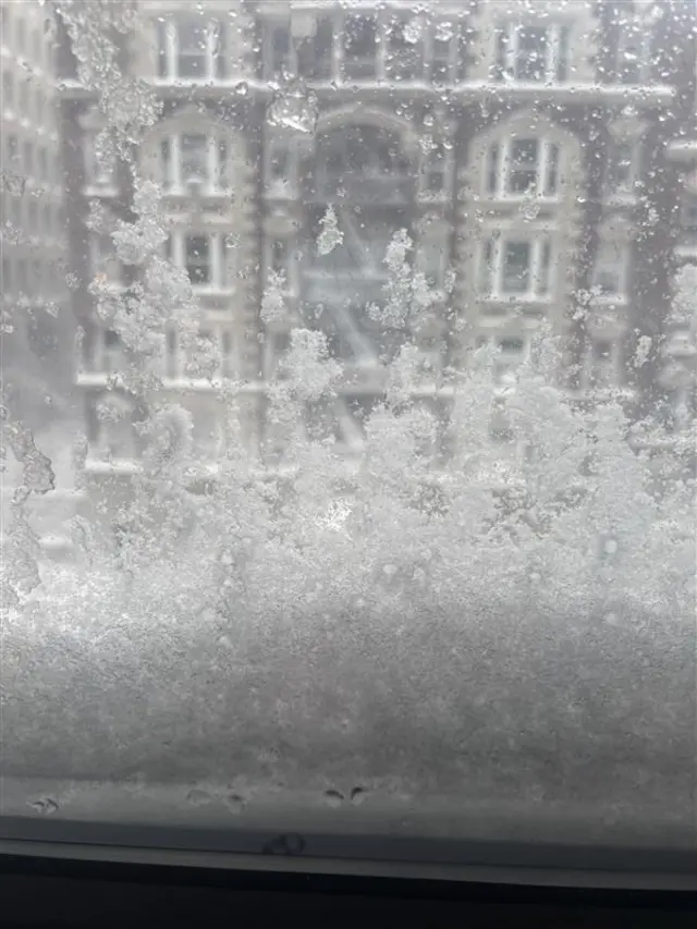 Snow fills up bottom of window