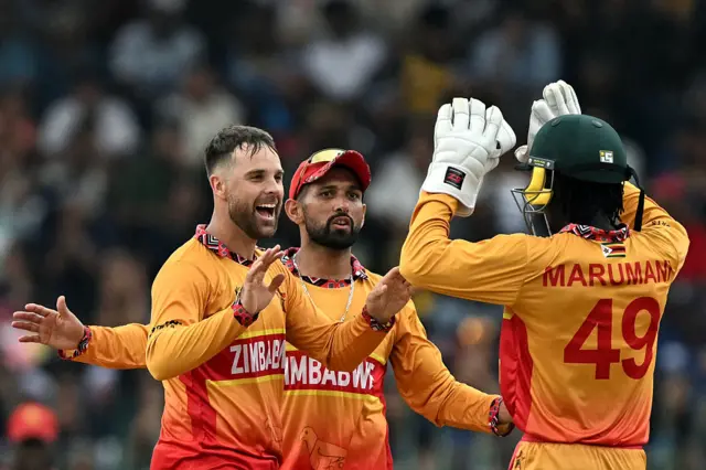 Zimbabwe players celebrate a wicket against Sri Lanka