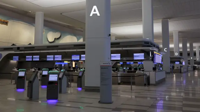 A view of an empty check-in area during a winter storm at LaGuardia Airport in New York City