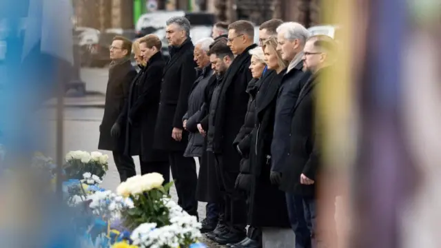 European leaders visit a makeshift memorial in Ukraine. We can see pictured: Ukraine's President Volodymyr Zelenskiy and his wife Olena, Finland's President Alexander Stubb, Estonia’s Prime Minister Kristen Michal, Croatia's Prime Minister Andrej Plenkovic, Denmark's Prime Minister Mette Frederiksen, Iceland's Prime Minister Kristrun Mjoll Frostadottir, Latvia's Prime Minister Evika Silina, Norway's Prime Minister Jonas Gahr Store, Sweden's Prime Minister Ulf Kristersson, Lithuanian Minister of National Defence Robertas Kaunas, President of the European Commission Ursula von der Leyen and European Council President Antonio Costa