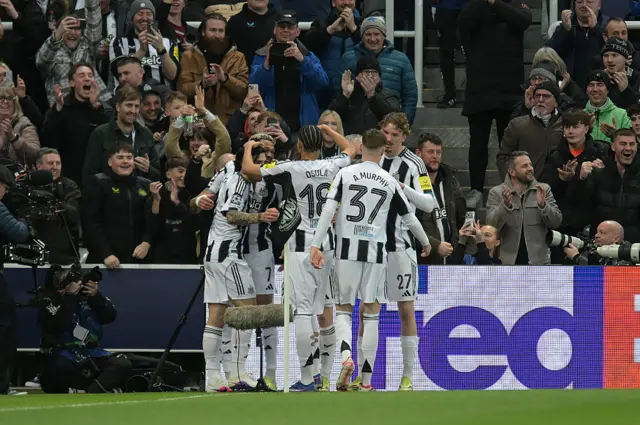 Sandro Tonali of Newcastle United celebrates with his teammates after scoring their first goal