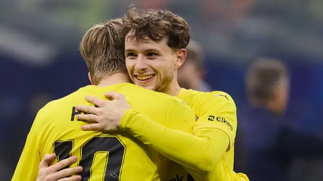 Jens Petter Hauge and Hakon Evjen of Bodo/Glimt celebrate winning the match against FC Internazionale during the UEFA Champions League 2025/26 League Knockout Play-off Second Leg match between FC Internazionale Milano and FK Bodo/Glimt at Stadio San Siro