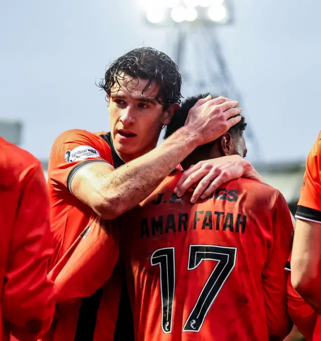 Dundee United's Amar Fatah (R) celebrates scoring to make it 1-0 with Ross Graham during a William Hill Premiership match between Dundee United and Kilmarnock at the CalForth Construction Arena at Tannadice Park, on February 21, 2026, in Dundee, Scotland.