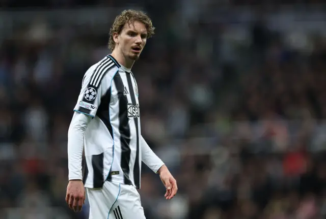 Nick Woltemade of Newcastle United looks on