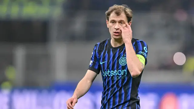 Nicolò Barella of FC Internazionale gestures during the UEFA Champions League 2025/26 League Knockout Play-off Second Leg match between FC Internazionale Milano and FK Bodo/Glimt at Stadio San Siro