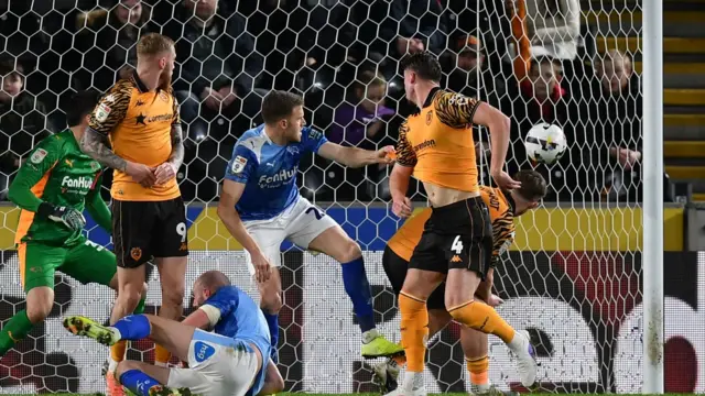 A Hull corner deflects off Callum Elder and into the back of the net