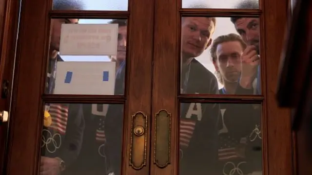Members of the US Olympic gold medal hockey team wait backstage ahead