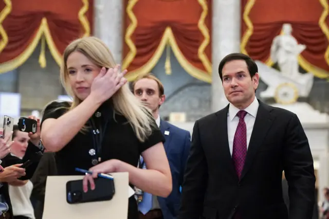 Marco Rubio (right), Secretary of State