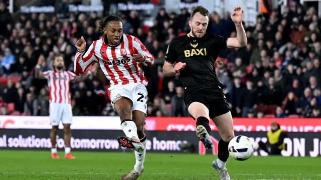 Lamine Cisse scoring for Stoke against Oxford