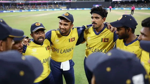 Dasun Shanaka of Sri Lanka speaks to his side