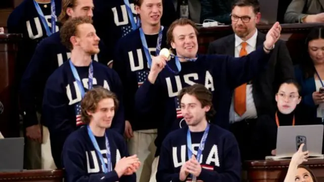 Members of the U.S. Olympic men's hockey team that won the gold medal
