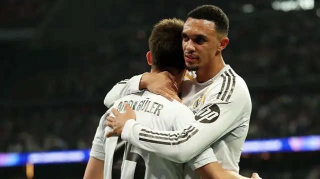 Arda Gueler hugs Trent Alexander-Arnold