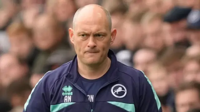 Alex Neil looks concerned on the Millwall sideline