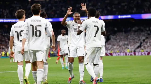 Vinicius Jr celebrates with his Real teammates