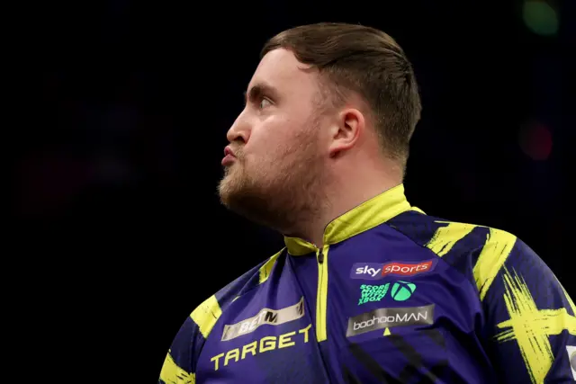 Luke Littler reacts during his match against Jonny Clayton on night four of the BetMGM Premier League 2026 at SSE Arena
