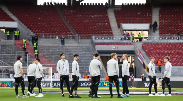 Celtic players out for a gander at the playing surface