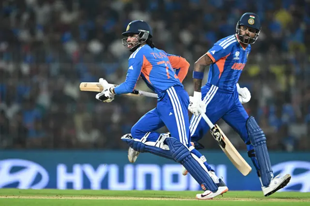 Hardik Pandya and Tilak Varma run between the wickets