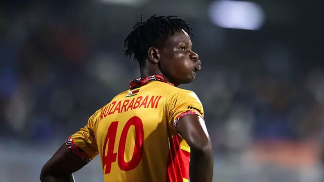 Blessing Muzarabani of Zimbabwe reacts