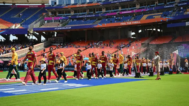 Shai Hope of West Indies and Aiden Markram of South Africa lead their teams out