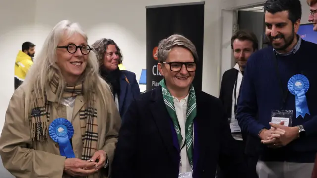 Conservative Party candidate Charlotte Cadden arrives during vote counting in the Gorton and Denton by-election