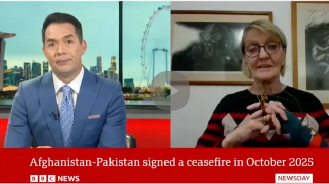 Split-screen screen capture of BBC News broadcast showing anchor Steve Lai interviewing jounalist Kathy Ganon formerly of the AP on recent fighting between Pakistan and Afghanistan