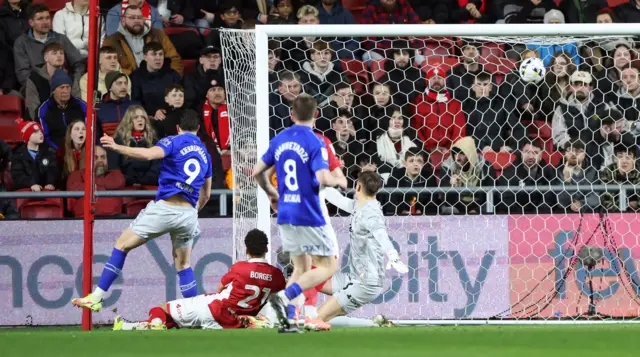 Luca Kjerrumgaard of Watford scores a goal