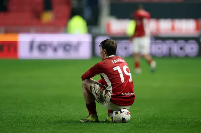 George Tanner of Bristol City sits dejected on the match ball