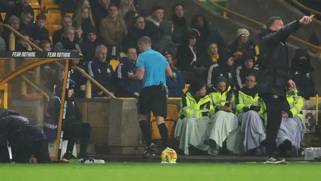 : Referee Craig Pawson leaves the pitch during the Premier League match between Wolverhampton Wanderers and Aston Villa