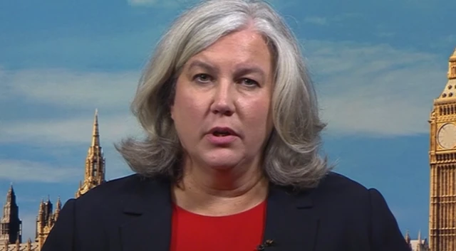 Heidi Alexander wears a red top and blazer as she appears live on BBC Breakfast