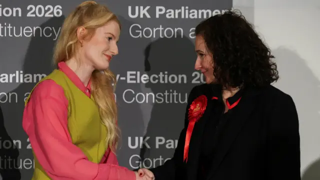 Labour Party candidate Angeliki Stogia congratulates Green Party's candidate Hannah Spencer