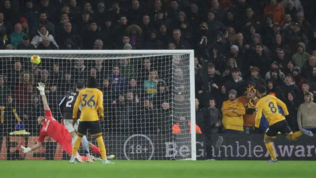Wolverhampton Wanderers' Brazilian midfielder #08 Joao Gomes (R) scores the opening goal of the English Premier League football match between Wolverhampton Wanderers and Aston Villa
