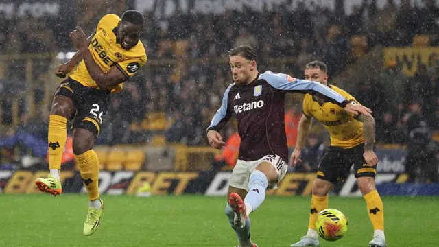 Wolverhampton Wanderers' Portuguese defender #24 Tote Gomes (L) shoots but fails to score during the English Premier League football match between Wolverhampton Wanderers and Aston Villa