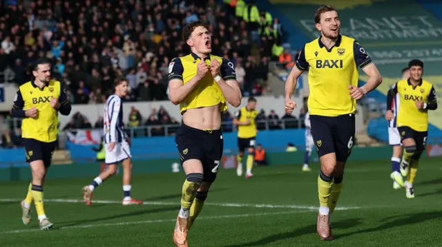 Oxford's Will Lankshear celebrates by lifting his shirt