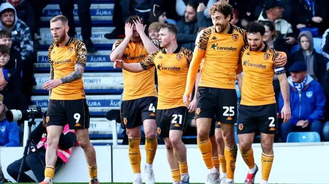 Hull players celebrate Matt Crooks' goal at Portsmouth
