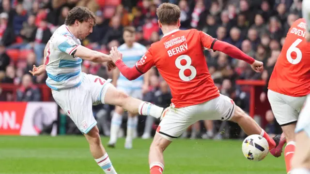 Ollie Rathbone scores the opener for Wrexham at Charlton