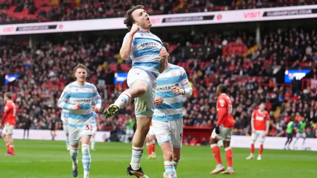 Wrexham's Ollie Rathbone celebrates