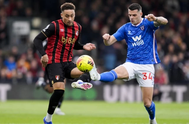 Sunderland's Granit Xhaka and Bournemouth's Marcus Tavernier (left) battle for the ball